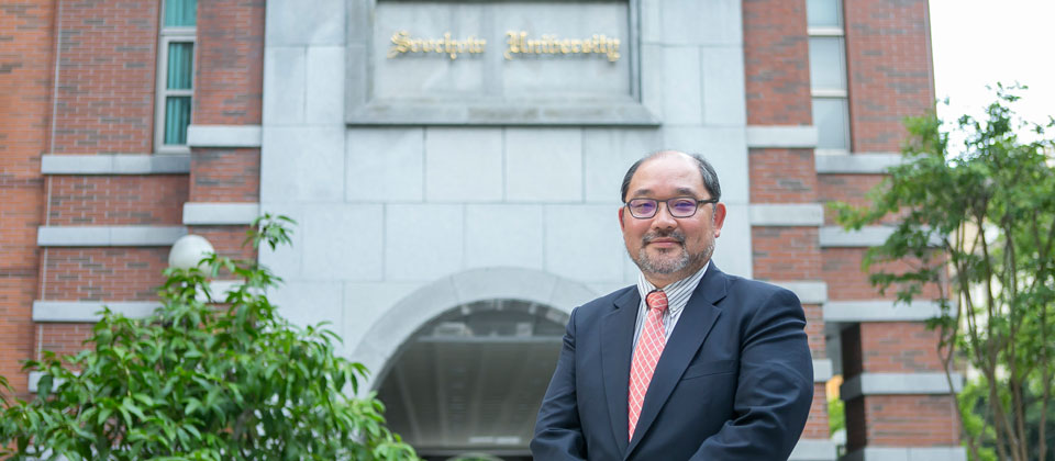 東吳大學法律系專任副教授兼電算中心主任余啟民